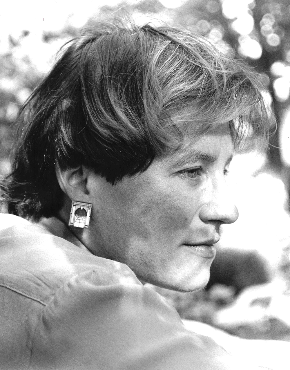 Black and white photo portrait of Christina Crosby in profile.